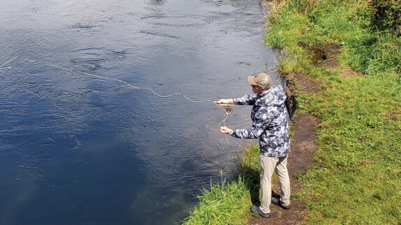 Testing the Infinity jacket on a fishing trip on the Waitahanui River in February. We experienced several summer showers during this trip about Taupo that gave the Infinity a good drenching. Photo: John Kesler